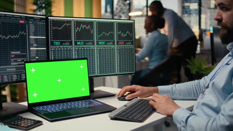 portfolio manager analyzes market trends on isolated screen laptop