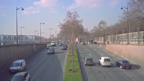 Morning-over-an-intersection-before-a-bridge-crossing-the-Seine-in-Paris,-France