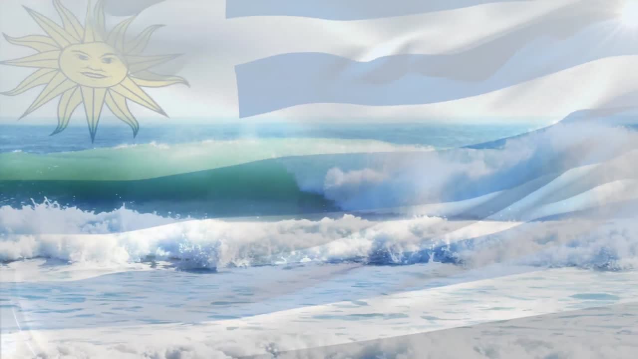 composición digital de la bandera uruguaya ondeando contra la vista aérea de las olas en el mar