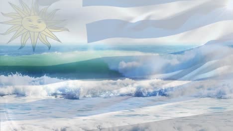 Digitale-Komposition-Der-Uruguayischen-Flagge,-Die-Vor-Der-Luftaufnahme-Der-Wellen-Im-Meer-Weht