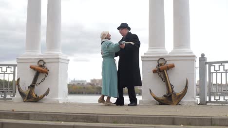emotional dance senior couple dancing together embrace at home elderly man and woman dancing bonding emotional dance senior couple dancing together embrace at home elderly man and woman dancing bonding smiling moving to the rhythm in romantic vibe enjoying their anniversary active relationship