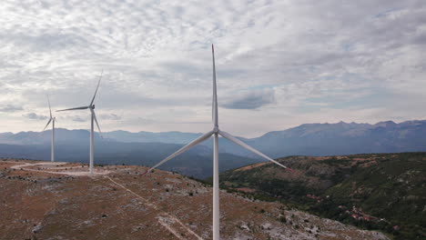 aerial view of wind turbines on a cloudy day