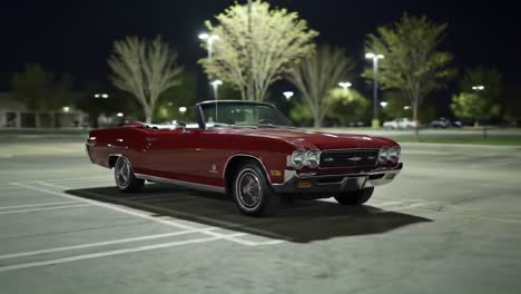 a striking classic convertible car parked elegantly at night, showcasing its timeless design and radiant red color under the subtle glow of streetlights