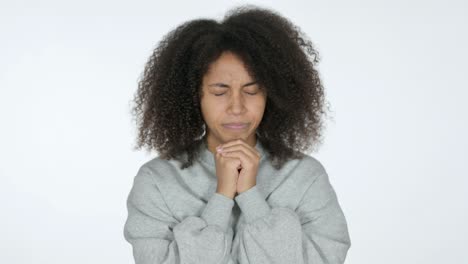 hopeful young african woman praying , white background