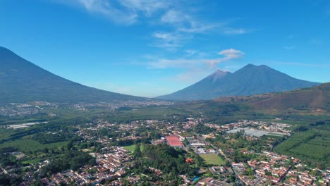 Volcano-Acatenango-and-Volcano-de-Fuego-near-Antigua,-Guatemala-suburbs