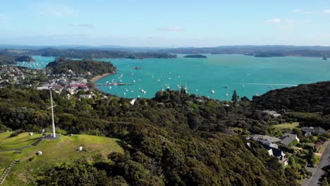 Bays-with-anchored-yachts-in-Russell,-Bay-of-Island-aerial-opening-shot