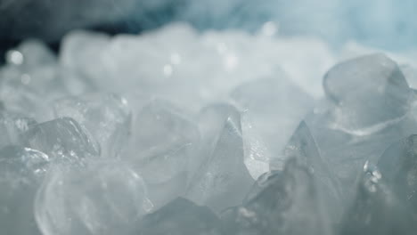 close-up of ice cubes with smoke