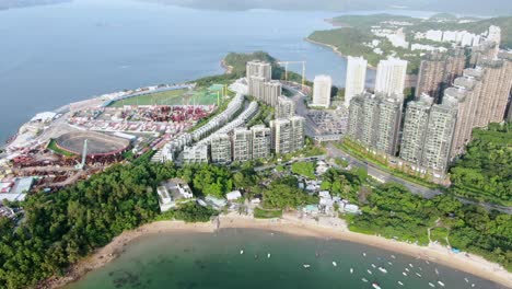 aerial view of hong kong wu kai sha area with modern residential building complex and open bay