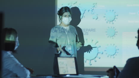 Female-Virologist-Giving-Presentation-about-Coronavirus