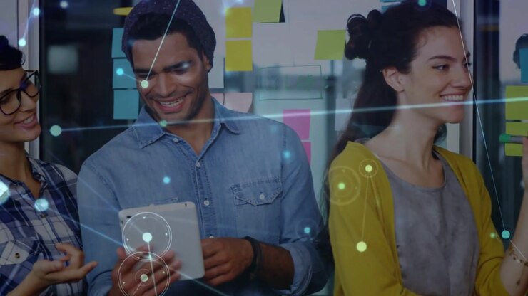 Tim Bisnis Muda Berkolaborasi dalam Ide dengan Hamparan Jaringan Digital