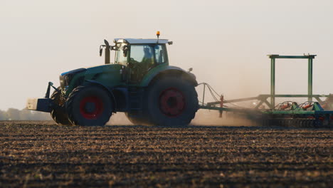 Tractor-plows-through-the-soil-1