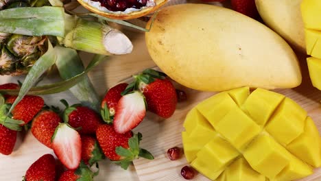 variety of fruits displayed on a white background