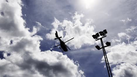 emergency helicopter flying by on a sunny and cloudy day