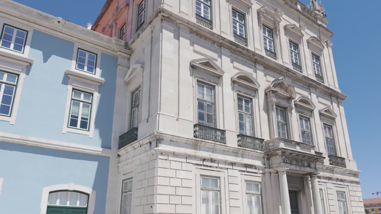 Torreao Poente, a historical landmark in Lisbon, Portugal, displays its architectural beauty and colorful facade against a clear blue sky
