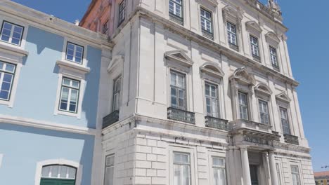 torreao poente, a historical landmark in lisbon, portugal, displays its architectural beauty and colorful facade against a clear blue sky