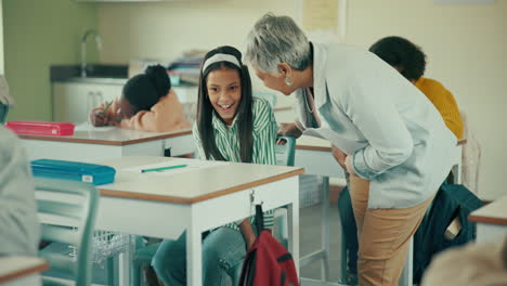 teacher interacting with student in classroom
