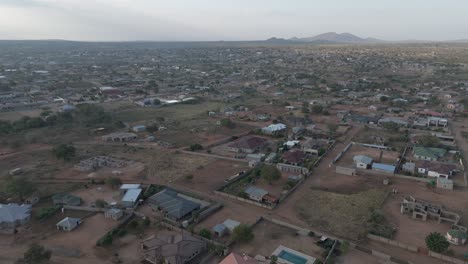 aerial drone view of a rural township with vast residential housing