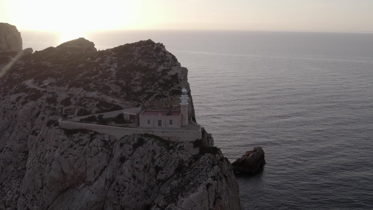 Faro su isola al crepuscolo, Dragonera, Isole Baleari, Spagna