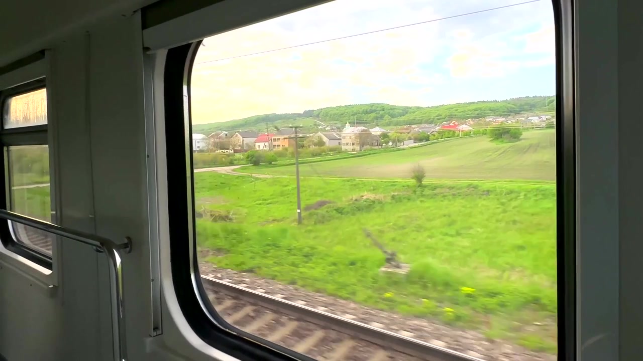 View of Rural Landscape From Moving Train Window