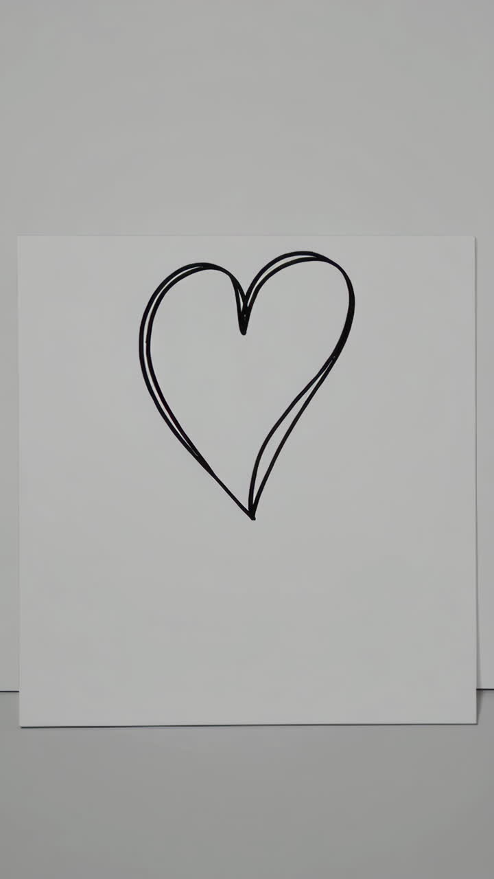 Hand-drawn heart on paper