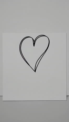 hand-drawn heart on paper
