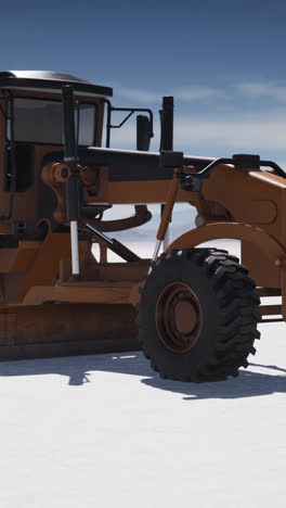 close-up of a grader on a construction site