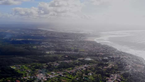 drone shot panning over figueira da foz in portugal