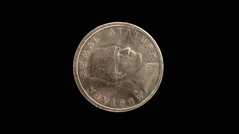 turkey 2000 commemorative 100 000 lira coin reverse with atatürk bust rotating on black background