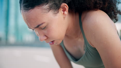 fitness, breathe and tired woman in the city