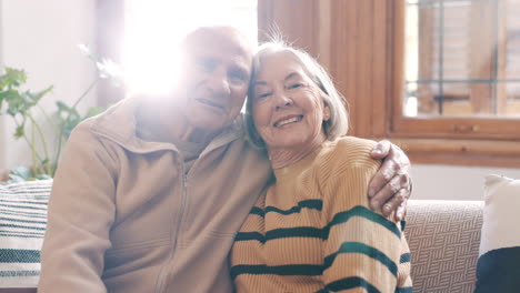 Elderly,-couple-or-hug-with-laugh-on-sofa