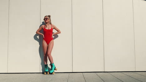 woman in red swimsuit and roller skates