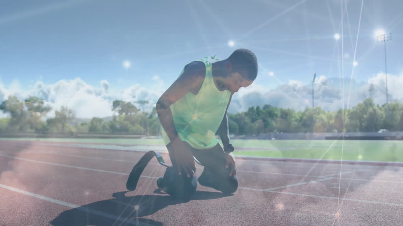 Kneeling on track, athlete with prosthetic legs using animation digital network