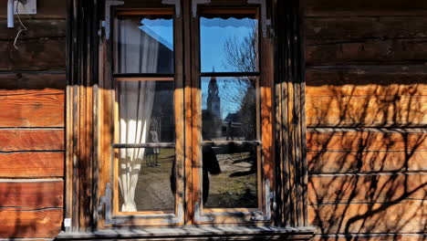 shadow reflections on the vintage walls of a wooden cabin