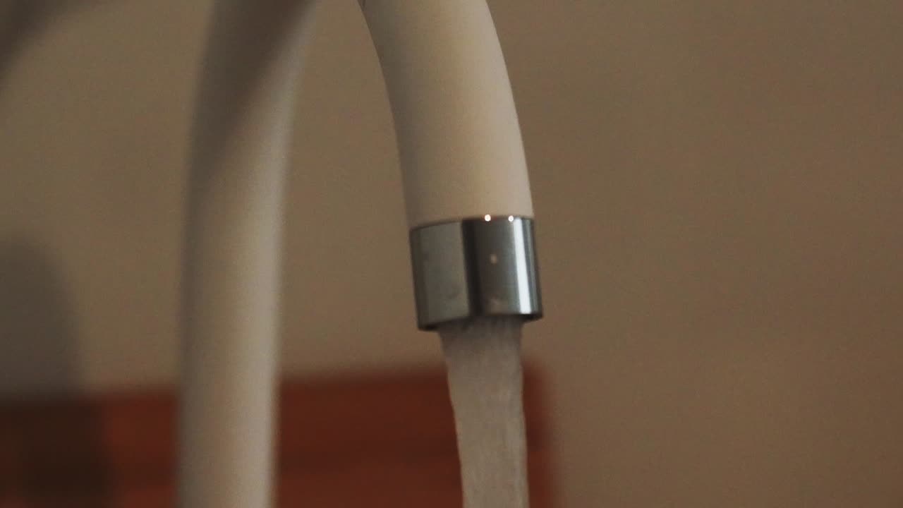 Tap water flowing in slowmotion