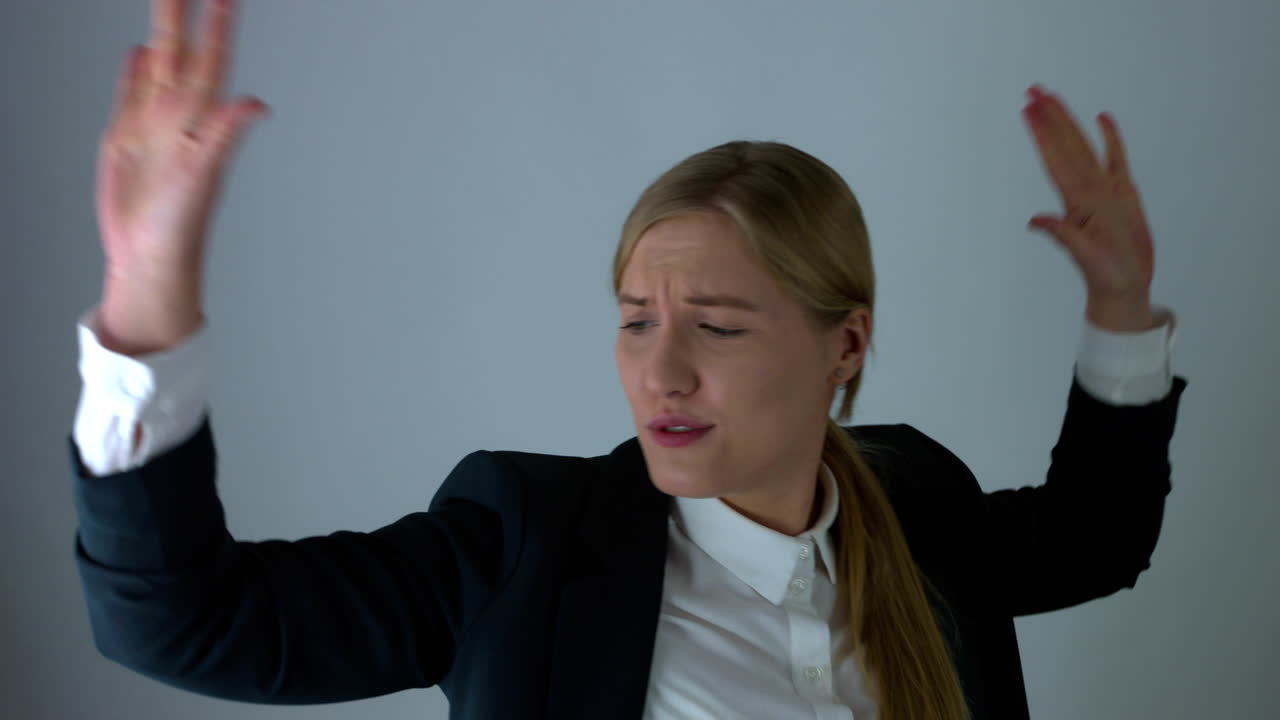 Successful winning business woman is dancing with happiness