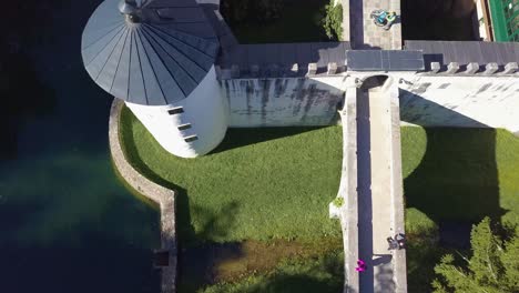 sneznik castle, aerial top down view on tower and people walking on bridge