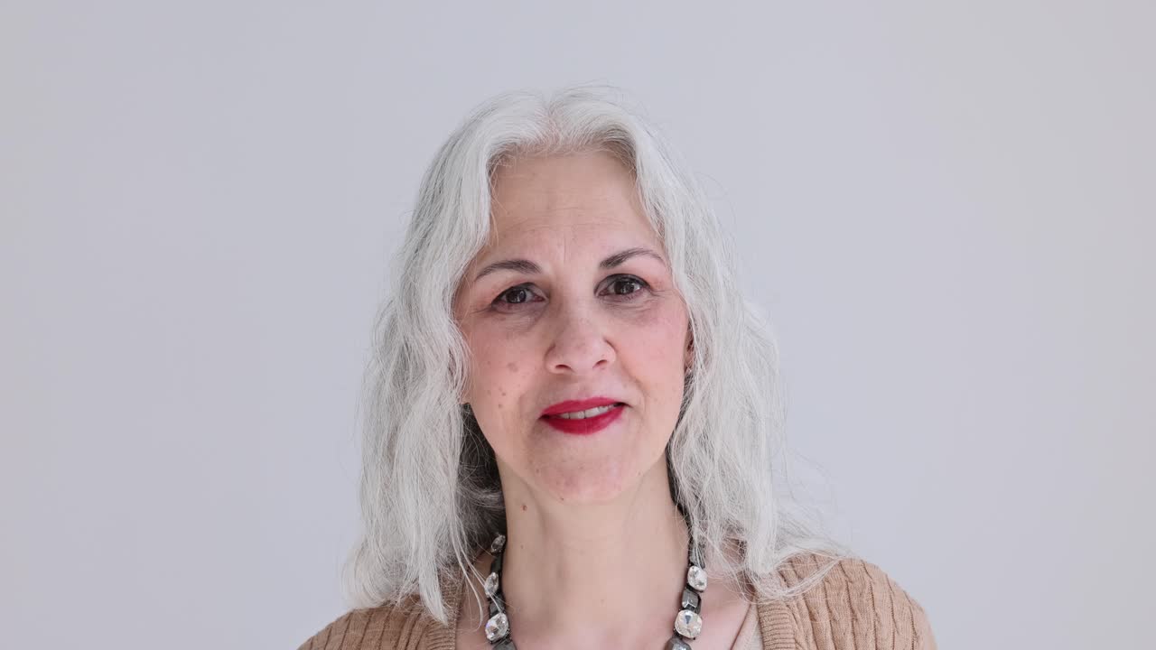 Portrait of a Senior Woman with Gray Hair and Red Lipstick
