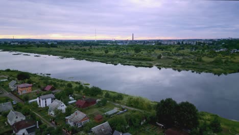 evening aerial of daugavpils with daugava river and summer houses