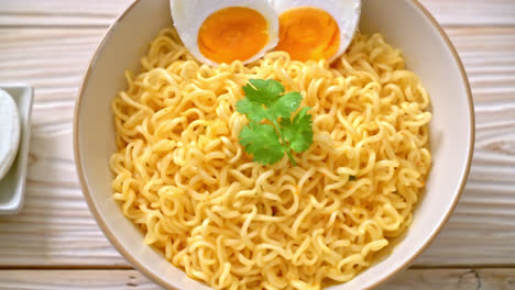 instant noodles bowl with salt egg