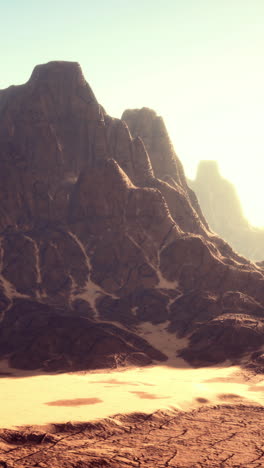 Stunning desert landscape at sunrise with majestic mountain formations