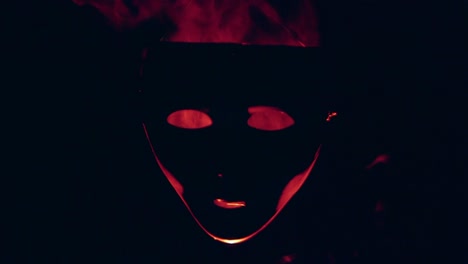 human mask in the red fire