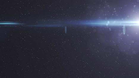 animation of glowing blue light over stars on night sky