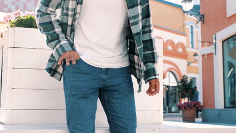 young man using phone outdoors