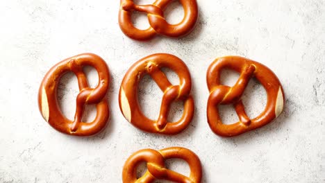 Assortment-of-fresh-baked-brown-salty-pretzel-bread