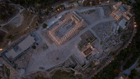 top down aerial shot over the acropolis at night