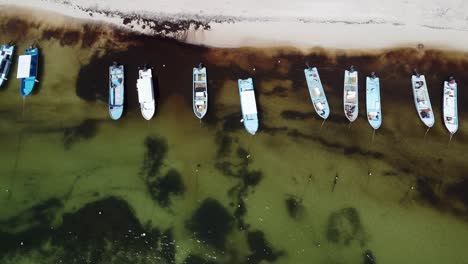 aerial footage of boats panning shot right to left