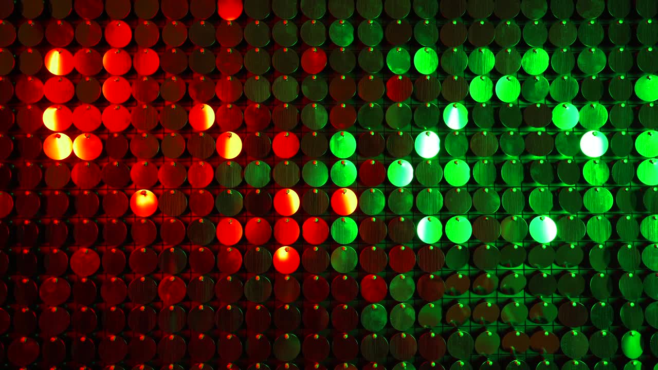 brillos rojos y verdes brillando fondo reflectante. pared de brillo cinético abstracto en movimiento. decoración de clubes nocturnos. se puede usar como transiciones, añadido a proyectos modernos, fondos de arte.