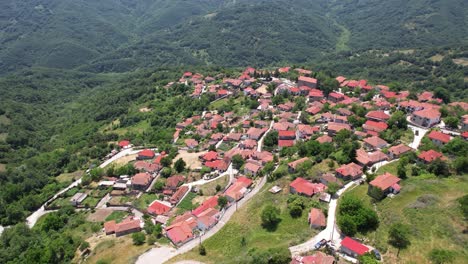 rentina village in agrafa mountains greece, scenic village inside forest in evritania nature, aerial dolly panoramic view