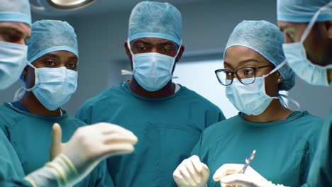 a focused surgical team collaborates in an operating room, demonstrating professionalism and precision in medical procedures with intense concentration