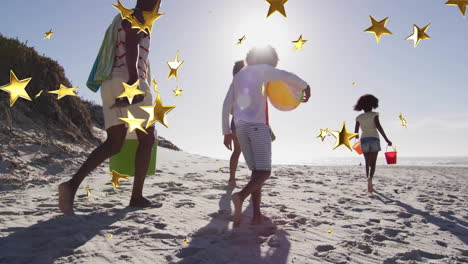 caminando por la playa de arena, la familia disfrutando de las vacaciones de verano con animación de estrellas